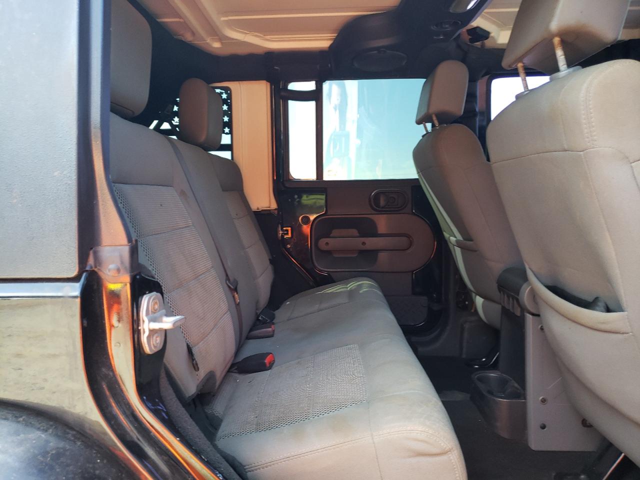 2009 Jeep Wrangler Unlimited Sahara VIN: 1J8GA59119L748734 Lot: 71823575