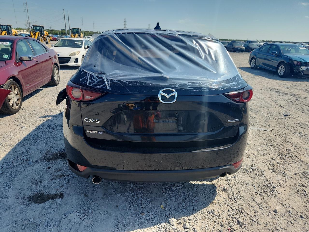 2021 Mazda Cx-5 Touring VIN: JM3KFACM6M0336325 Lot: 71085625