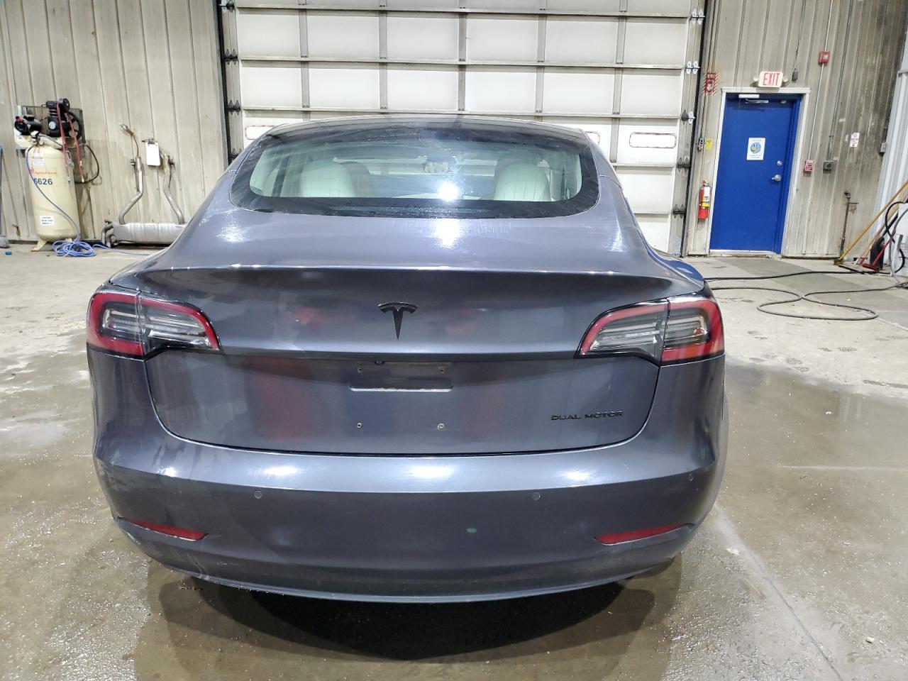 2018 Tesla Model 3 VIN: 5YJ3E1EB4JF099469 Lot: 71409995