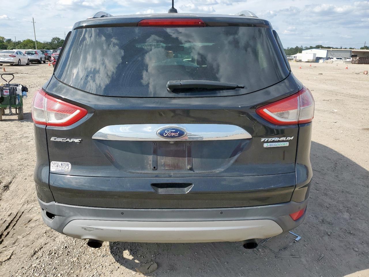 2014 Ford Escape Titanium VIN: 1FMCU0J95EUD24359 Lot: 84264875