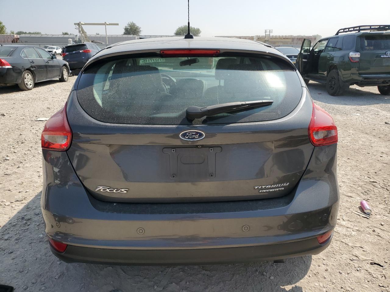 2015 Ford Focus Titanium VIN: 1FADP3N23FL274959 Lot: 71277115