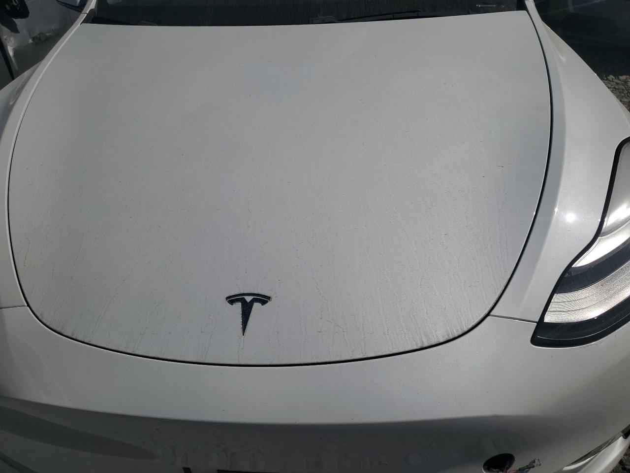 2021 Tesla Model Y VIN: 5YJYGDEEXMF077783 Lot: 70206405