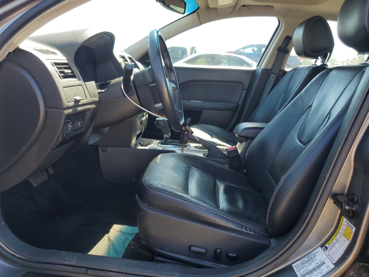 2012 Ford Fusion Hybrid VIN: 3FADP0L32CR429394 Lot: 71992385