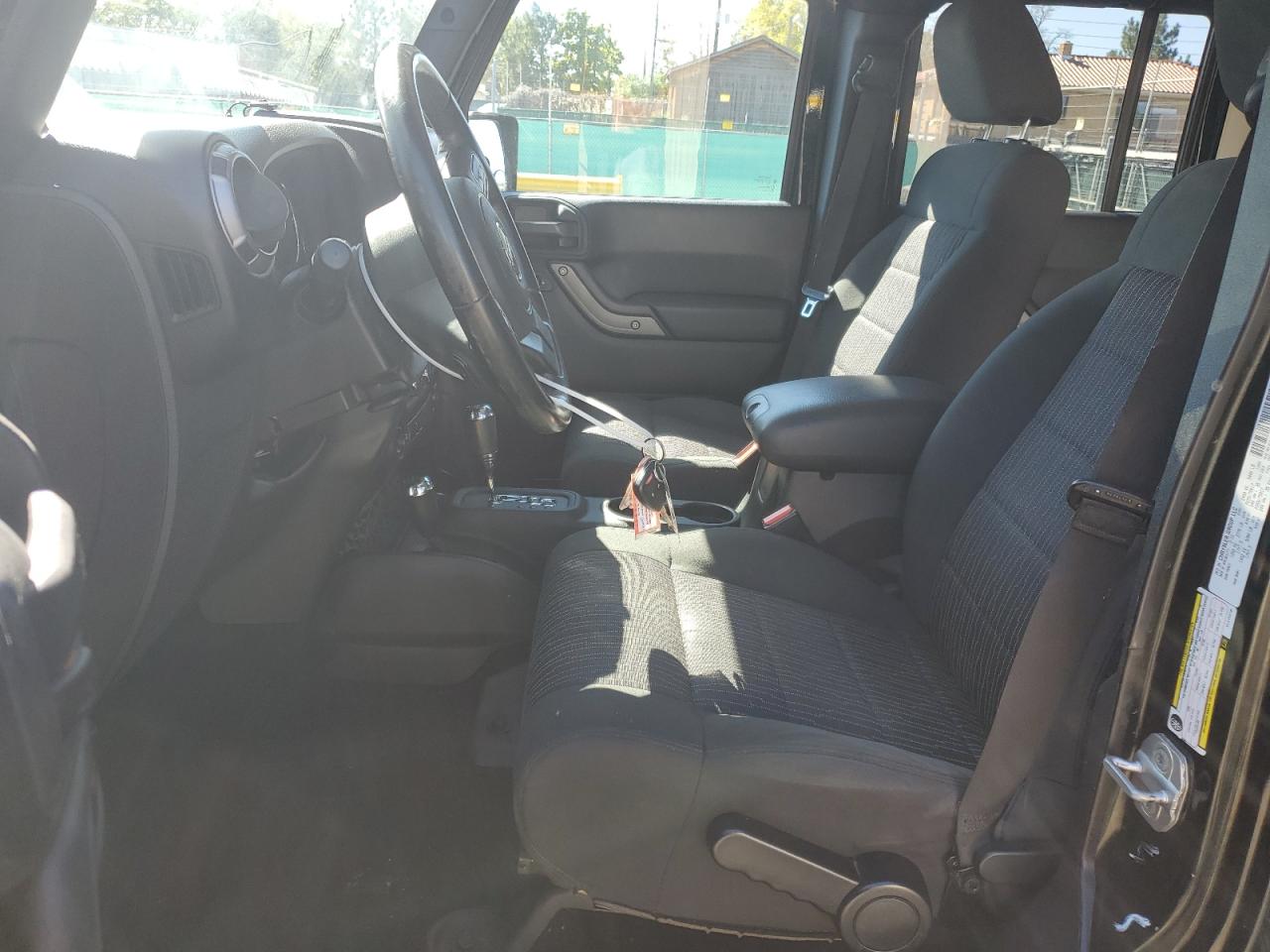 2012 Jeep Wrangler Unlimited Sport VIN: 1C4BJWDG6CL215210 Lot: 81741915