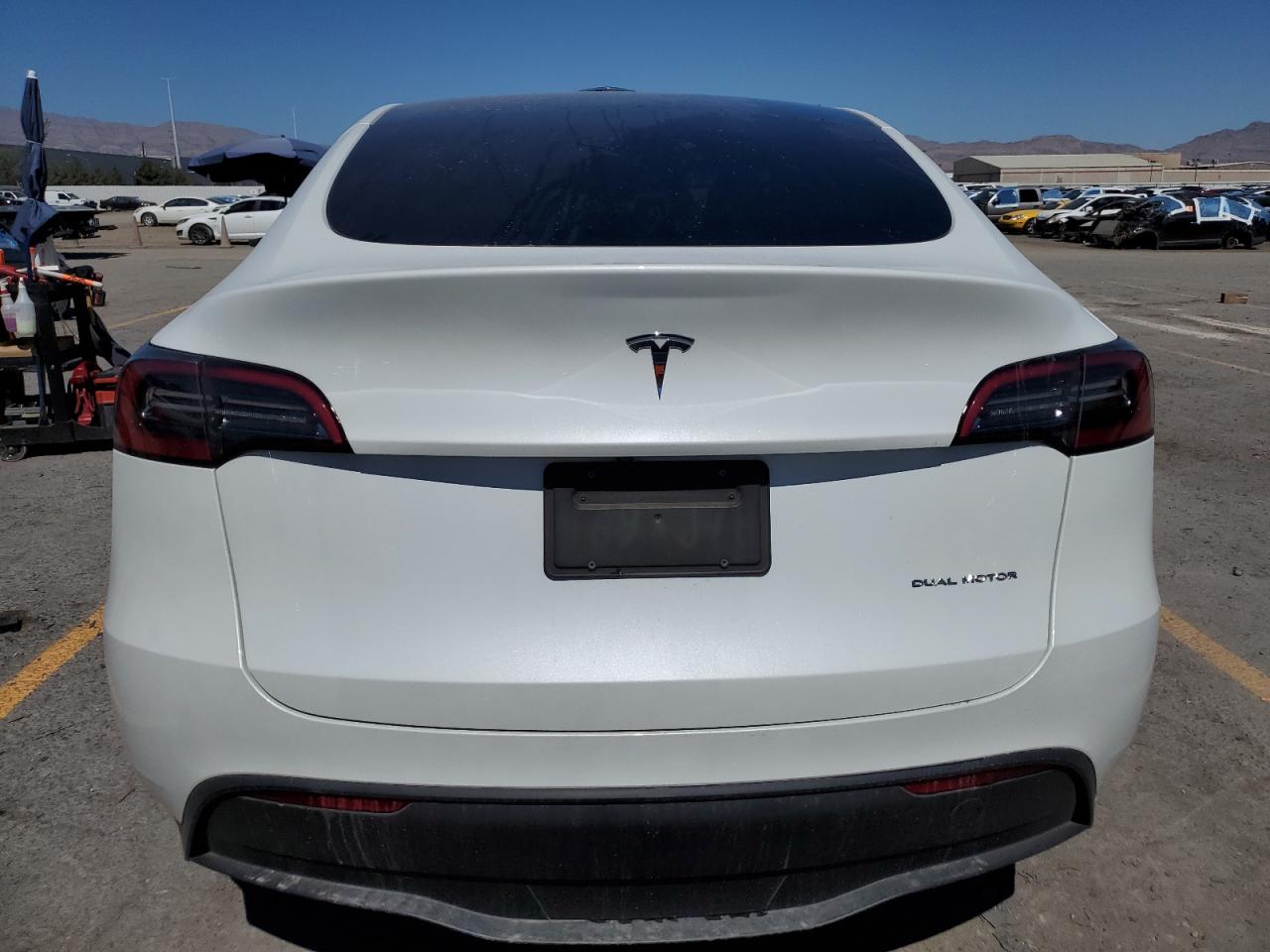 2023 Tesla Model Y VIN: 7SAYGDEE9PF688489 Lot: 82122015