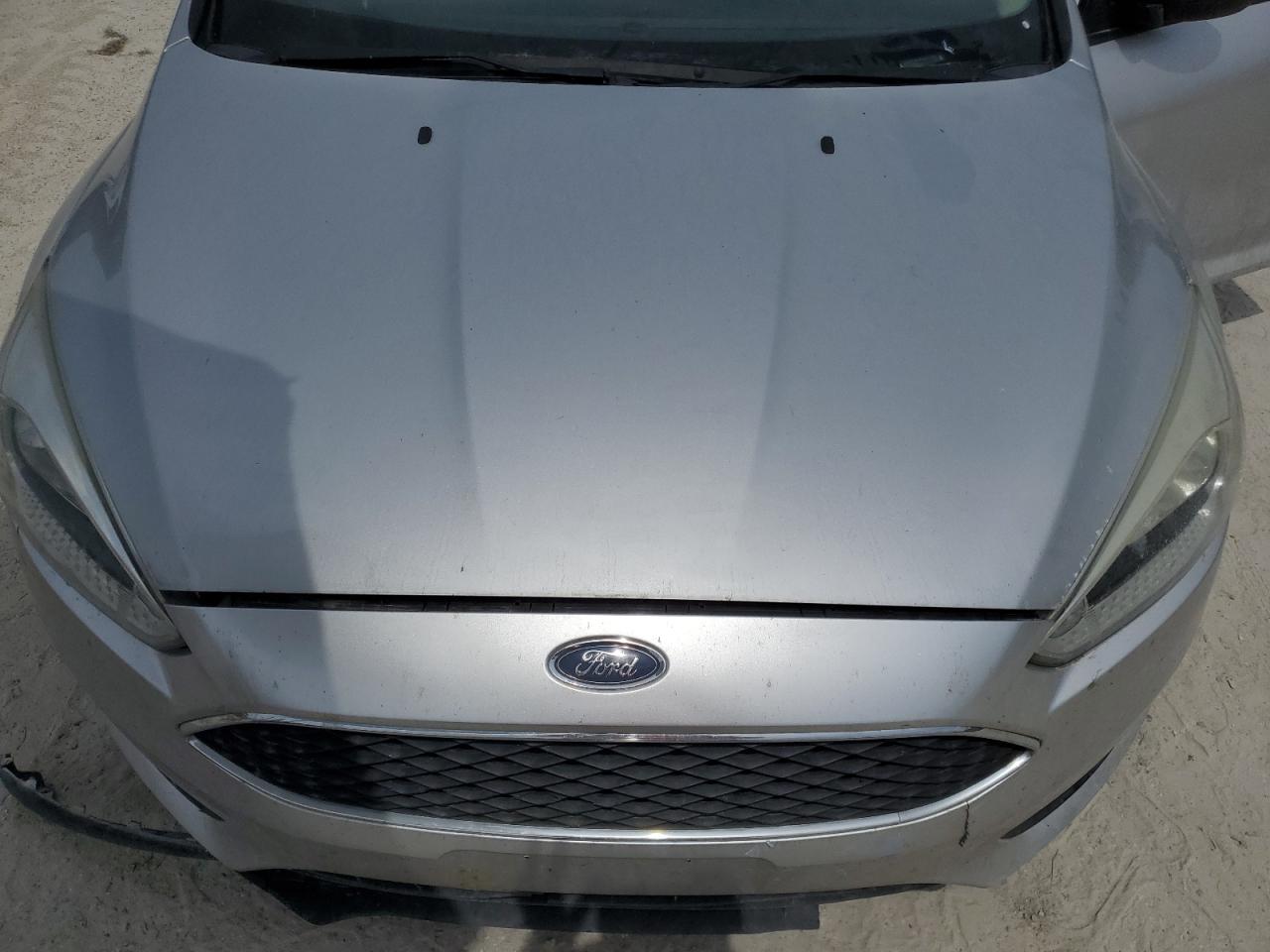 2016 Ford Focus S VIN: 1FADP3E25GL241365 Lot: 80901415