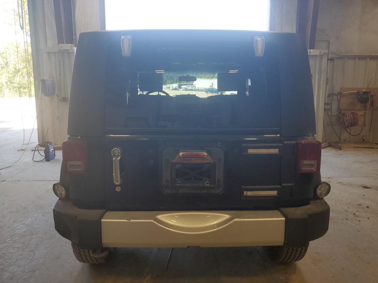 2009 Jeep Wrangler Sahara VIN: 1J8FA541X9L715587 Lot: 70871185