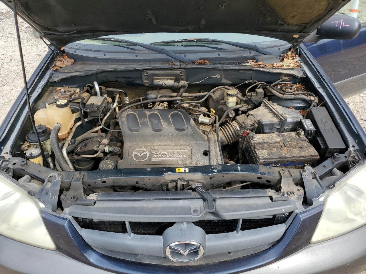 2004 Mazda Tribute Lx VIN: 4F2CZ94174KM32198 Lot: 81402895