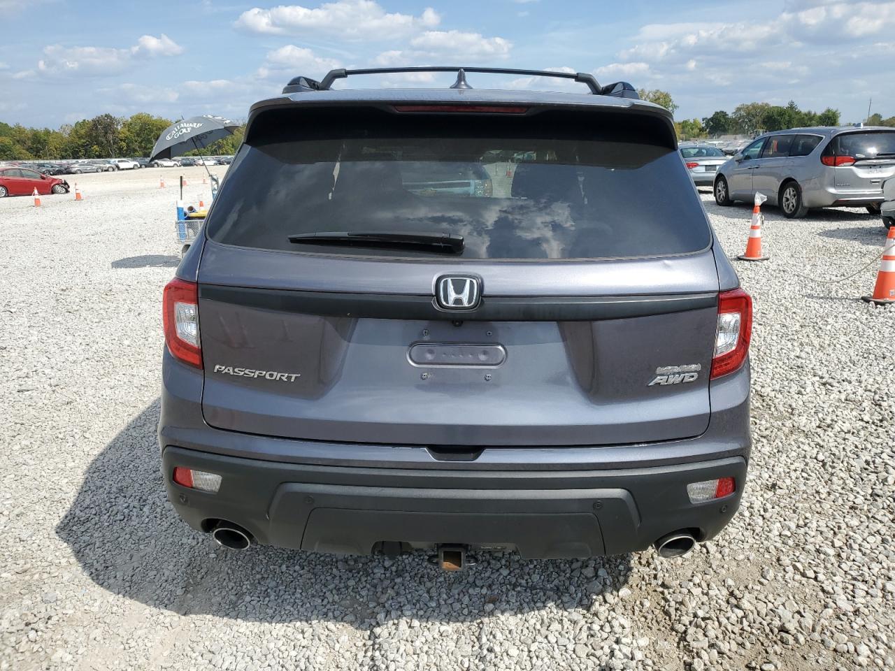 2020 Honda Passport Touring VIN: 5FNYF8H97LB015569 Lot: 80903265