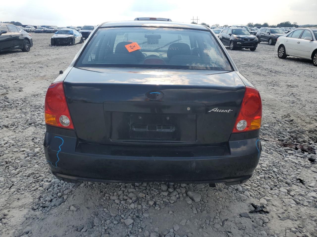 2004 Hyundai Accent Gl VIN: KMHCG45C34U529312 Lot: 80716245