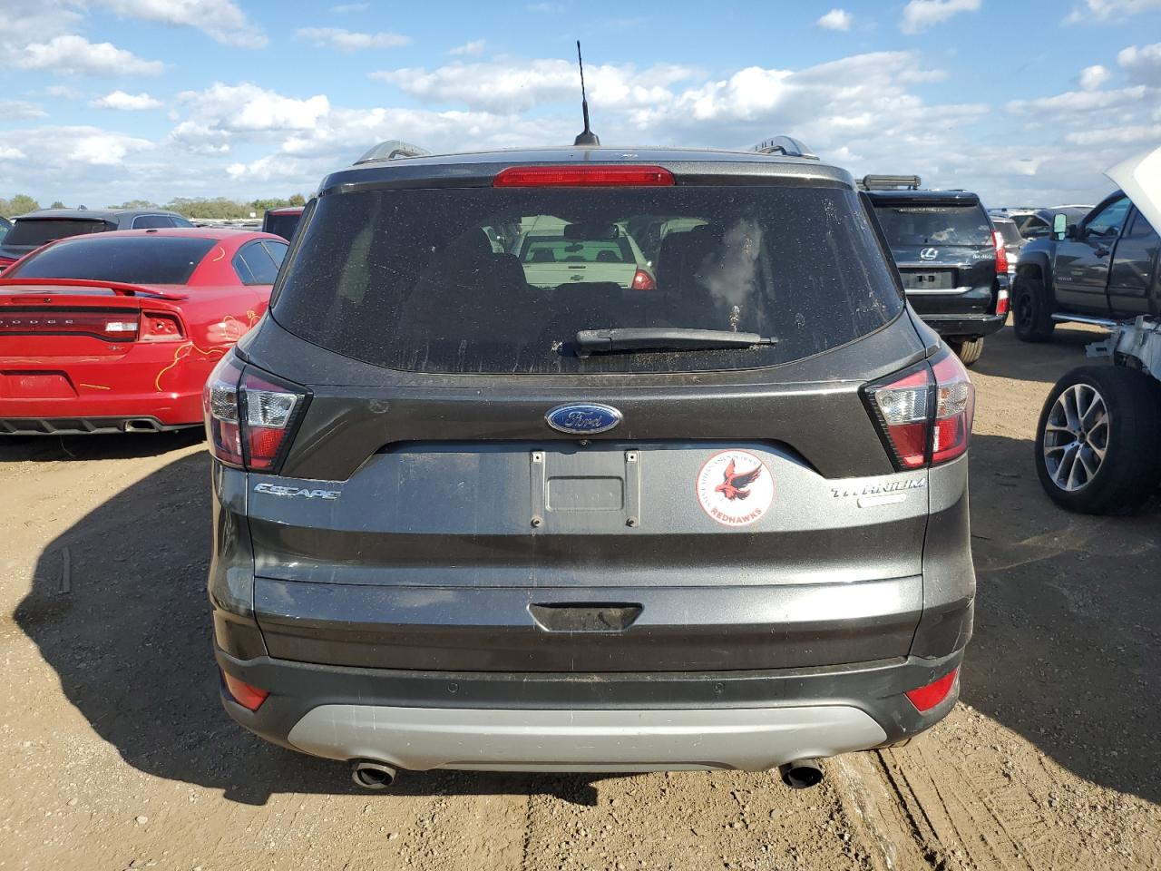 2017 Ford Escape Titanium VIN: 1FMCU0J99HUE18300 Lot: 83962825