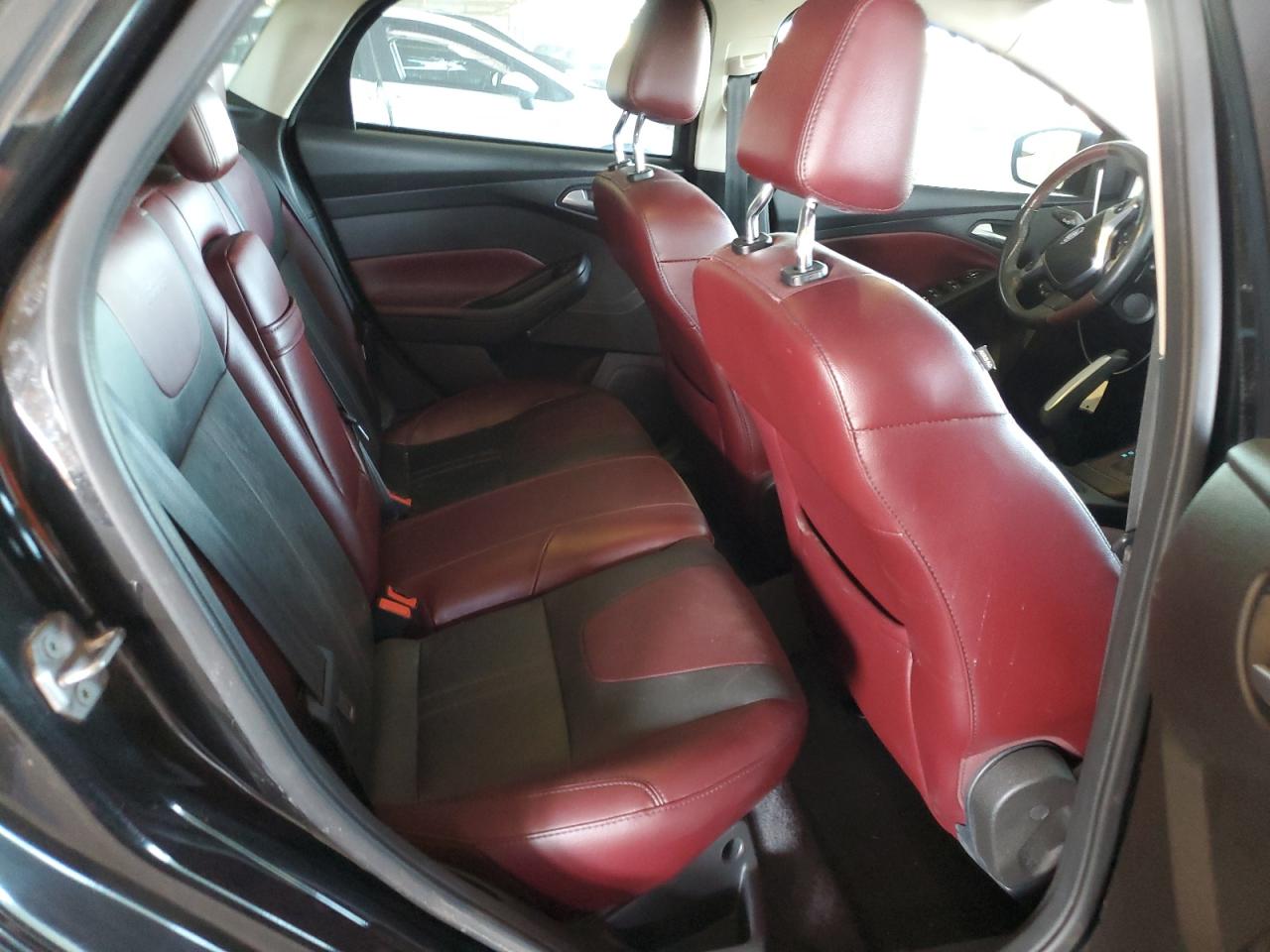 2012 Ford Focus Titanium VIN: 1FAHP3N21CL290526 Lot: 81444685