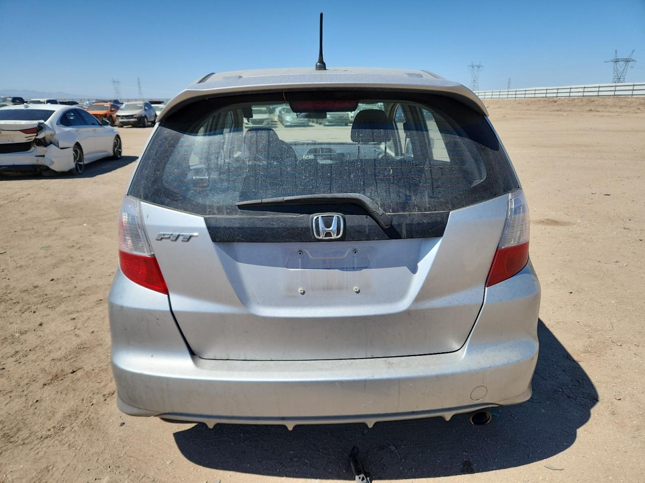 2012 Honda Fit Sport VIN: JHMGE8H57CC029785 Lot: 80806615