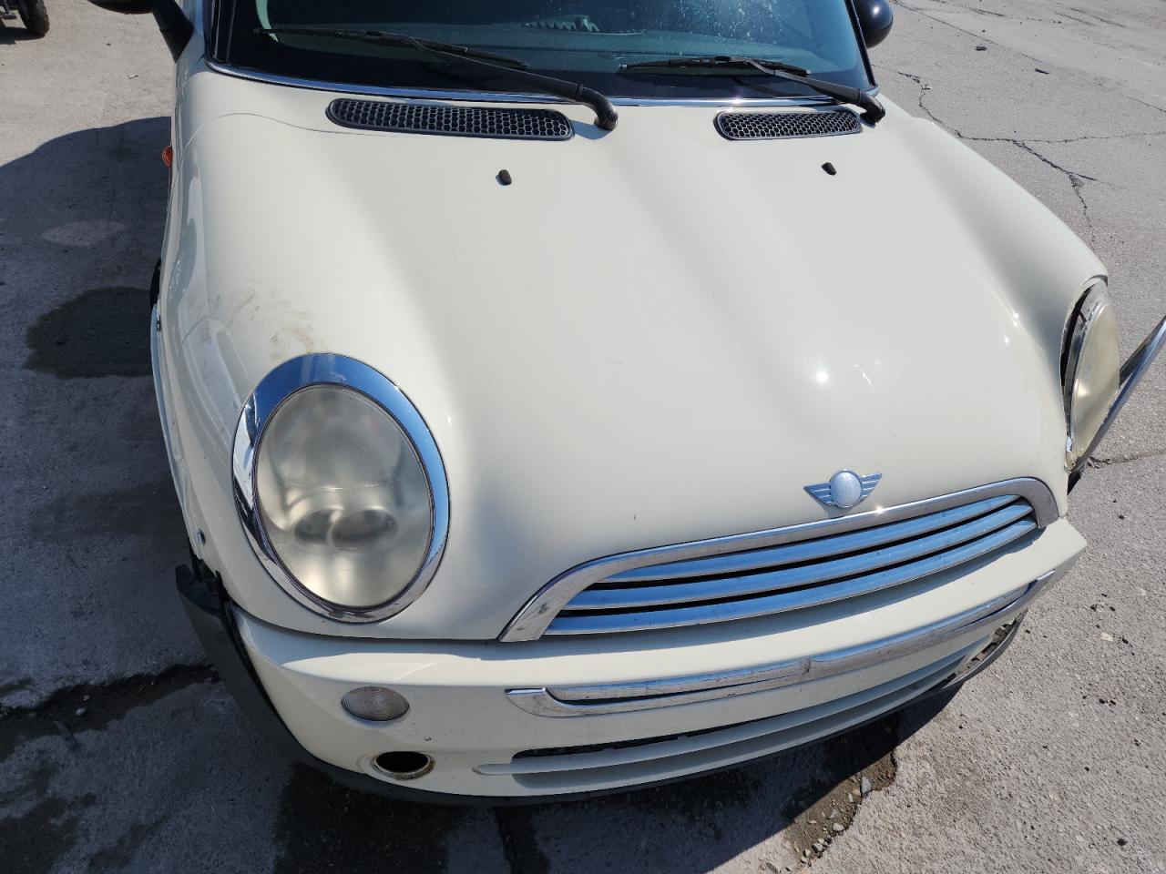 2006 Mini Cooper VIN: WMWRC33556TJ77431 Lot: 80389785