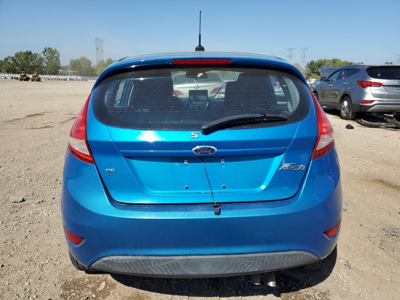 2012 Ford Fiesta Se VIN: 3FADP4EJ9CM102104 Lot: 80645345