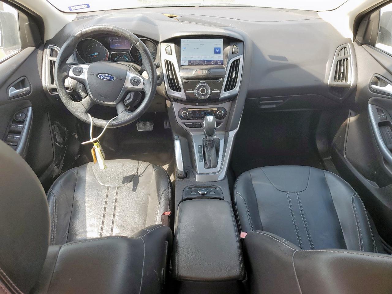 2012 Ford Focus Titanium VIN: 1FAHP3N20CL480057 Lot: 80876945