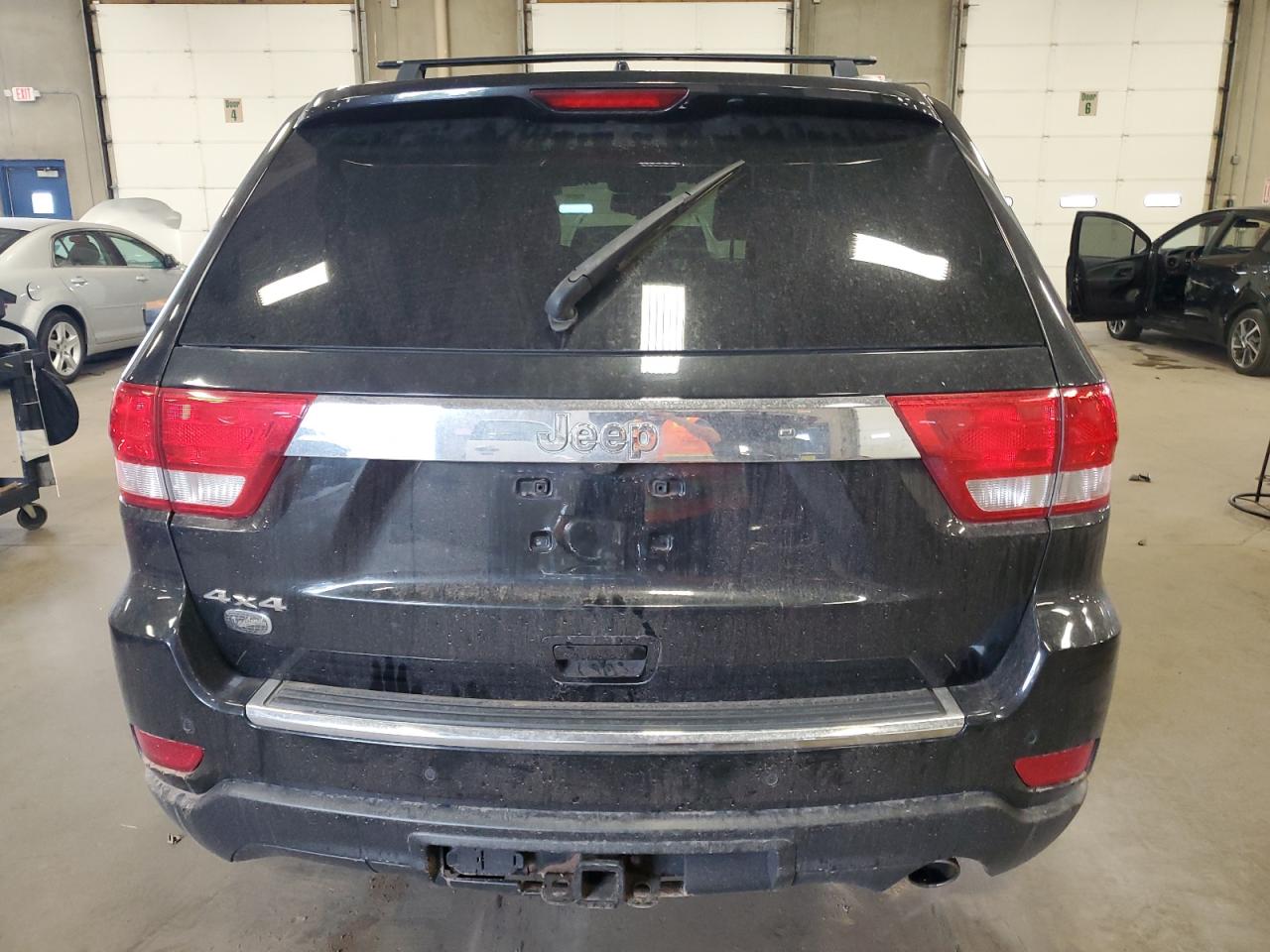 2012 Jeep Grand Cherokee Overland VIN: 1C4RJFCG5CC214050 Lot: 66410885