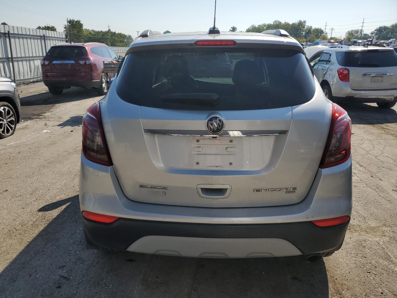 2018 Buick Encore Essence VIN: KL4CJGSM8JB582299 Lot: 80642495