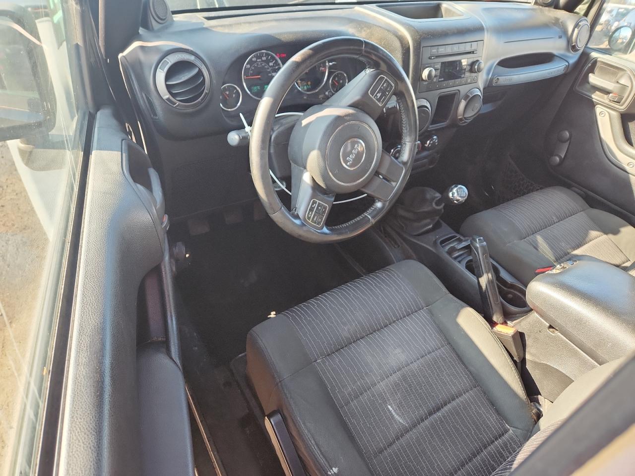 2012 Jeep Wrangler Sport VIN: 1C4AJWAGXCL110511 Lot: 80013445