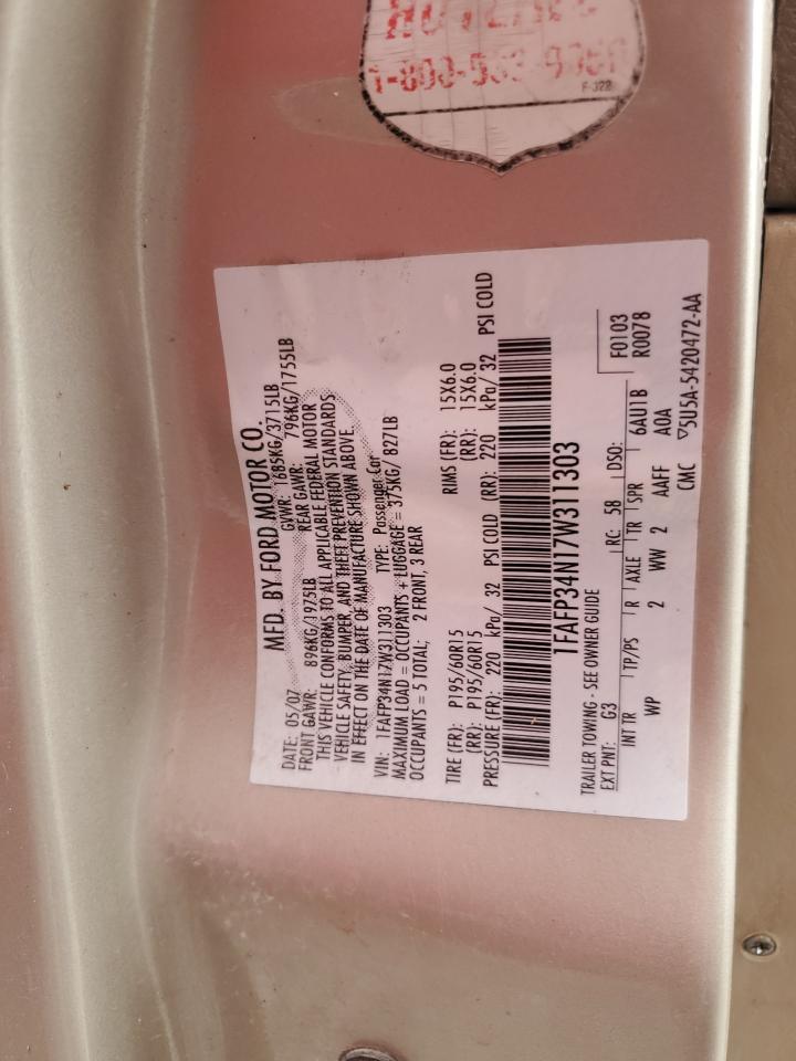 2007 Ford Focus Zx4 VIN: 1FAFP34N17W311303 Lot: 81081975