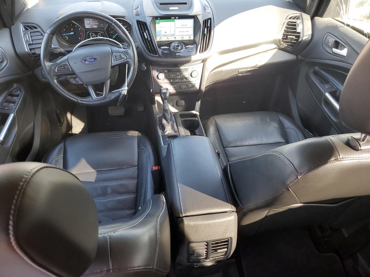 2017 Ford Escape Titanium VIN: 1FMCU0J99HUE18300 Lot: 83962825