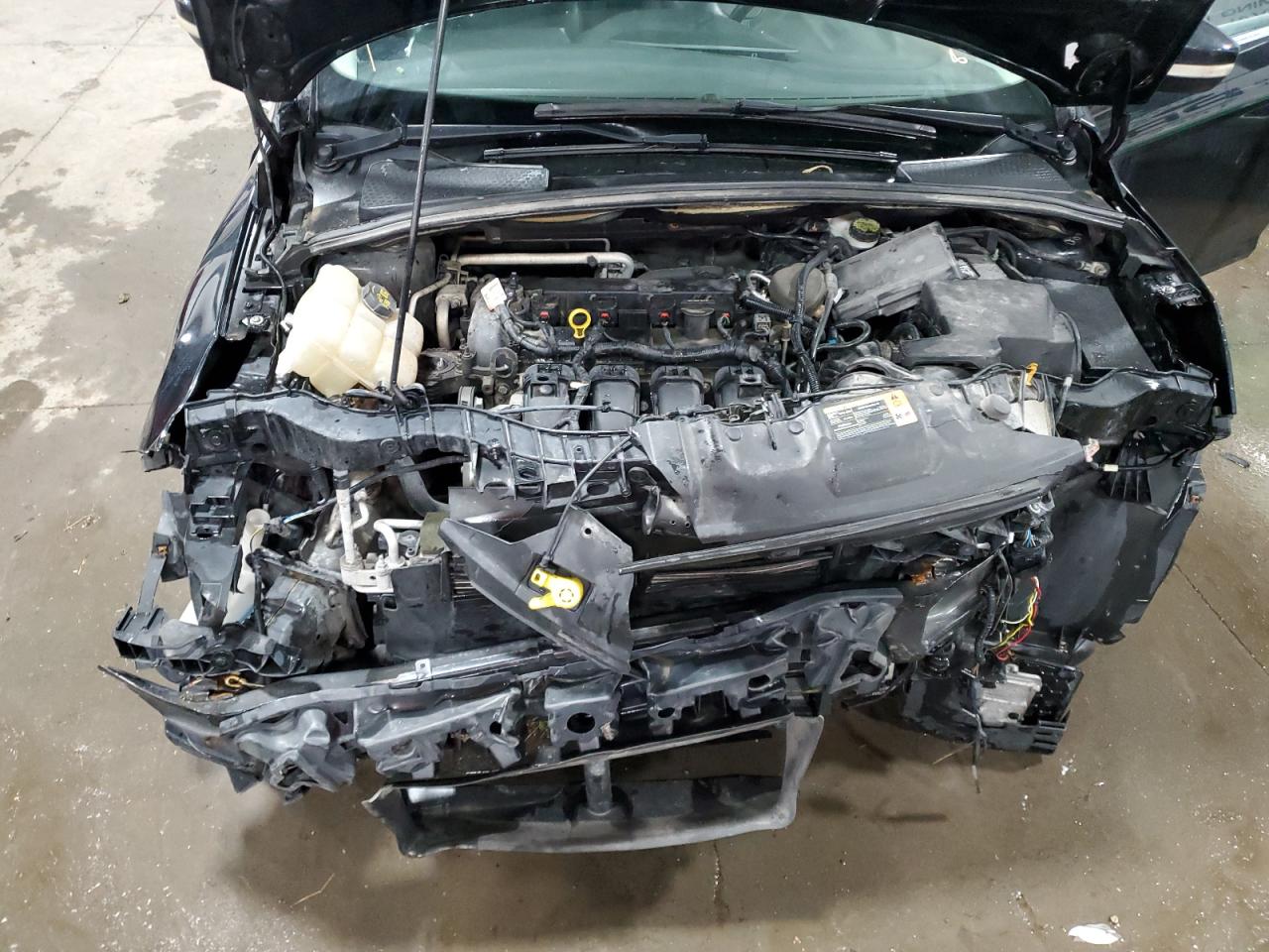 2014 Ford Focus Titanium VIN: 1FADP3J28EL169256 Lot: 69953265