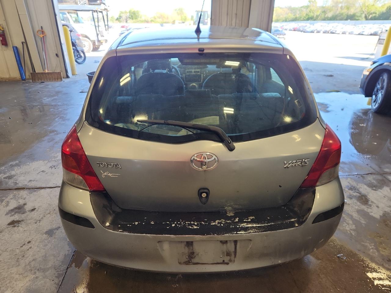 2010 Toyota Yaris VIN: JTDKT4K36A5321849 Lot: 80727955