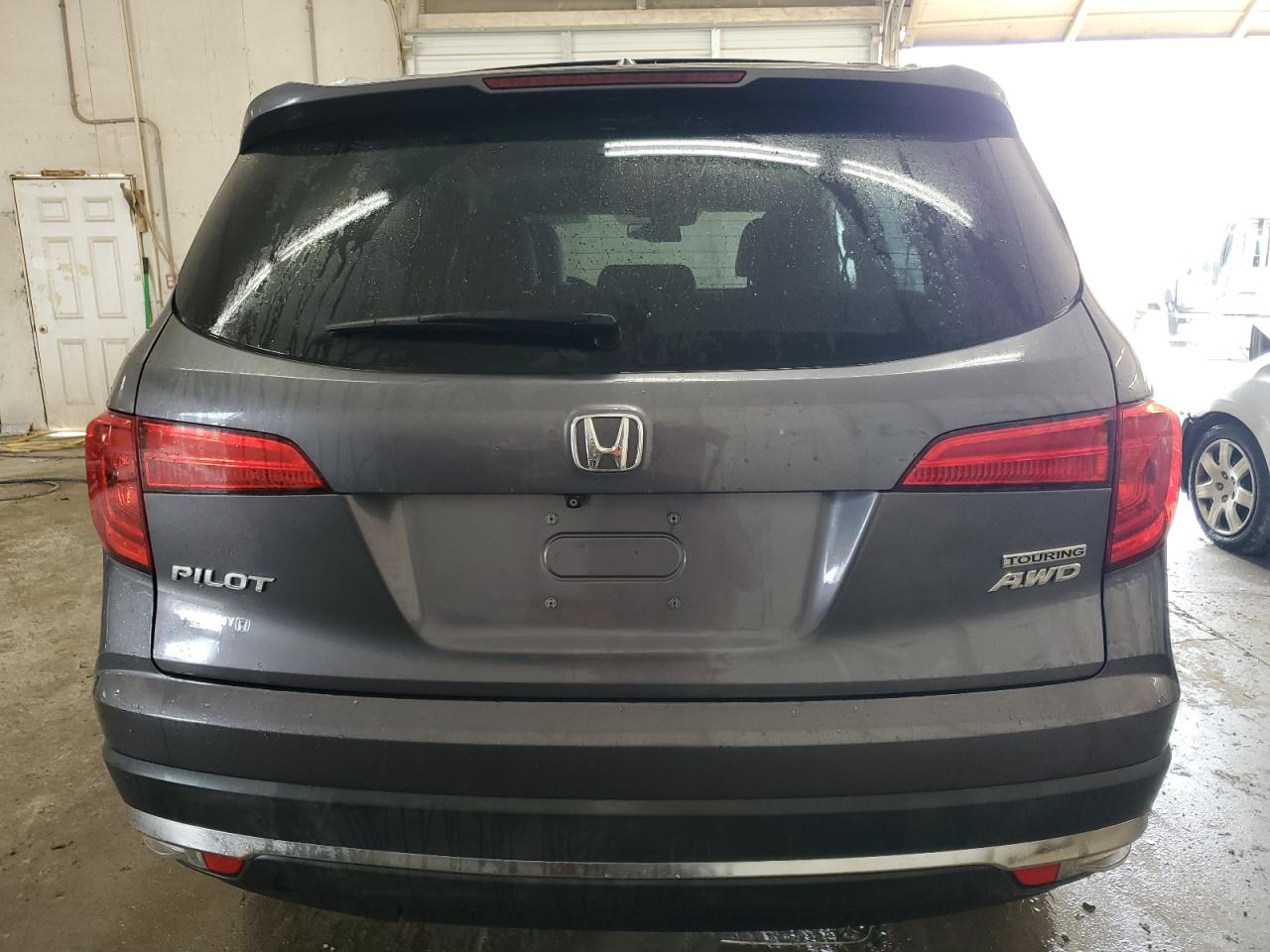 2018 Honda Pilot Touring VIN: 5FNYF6H97JB016545 Lot: 81619265