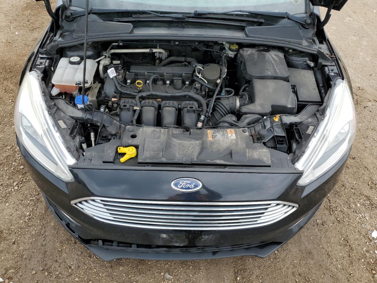 2016 Ford Focus Titanium VIN: 1FADP3N23GL302616 Lot: 81018465