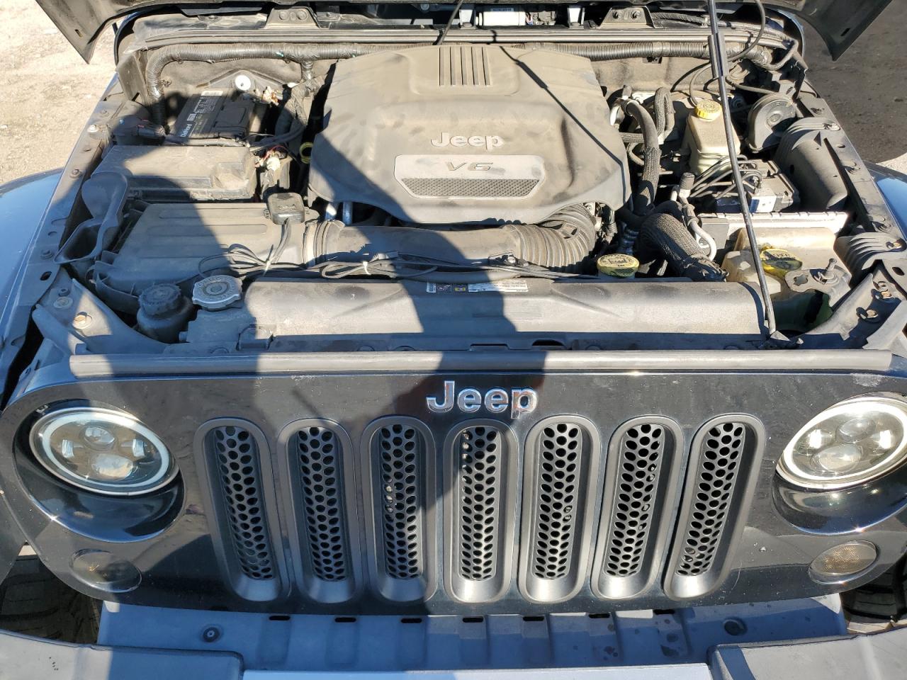 2014 Jeep Wrangler Unlimited Sahara VIN: 1C4BJWEG0EL277994 Lot: 71354005