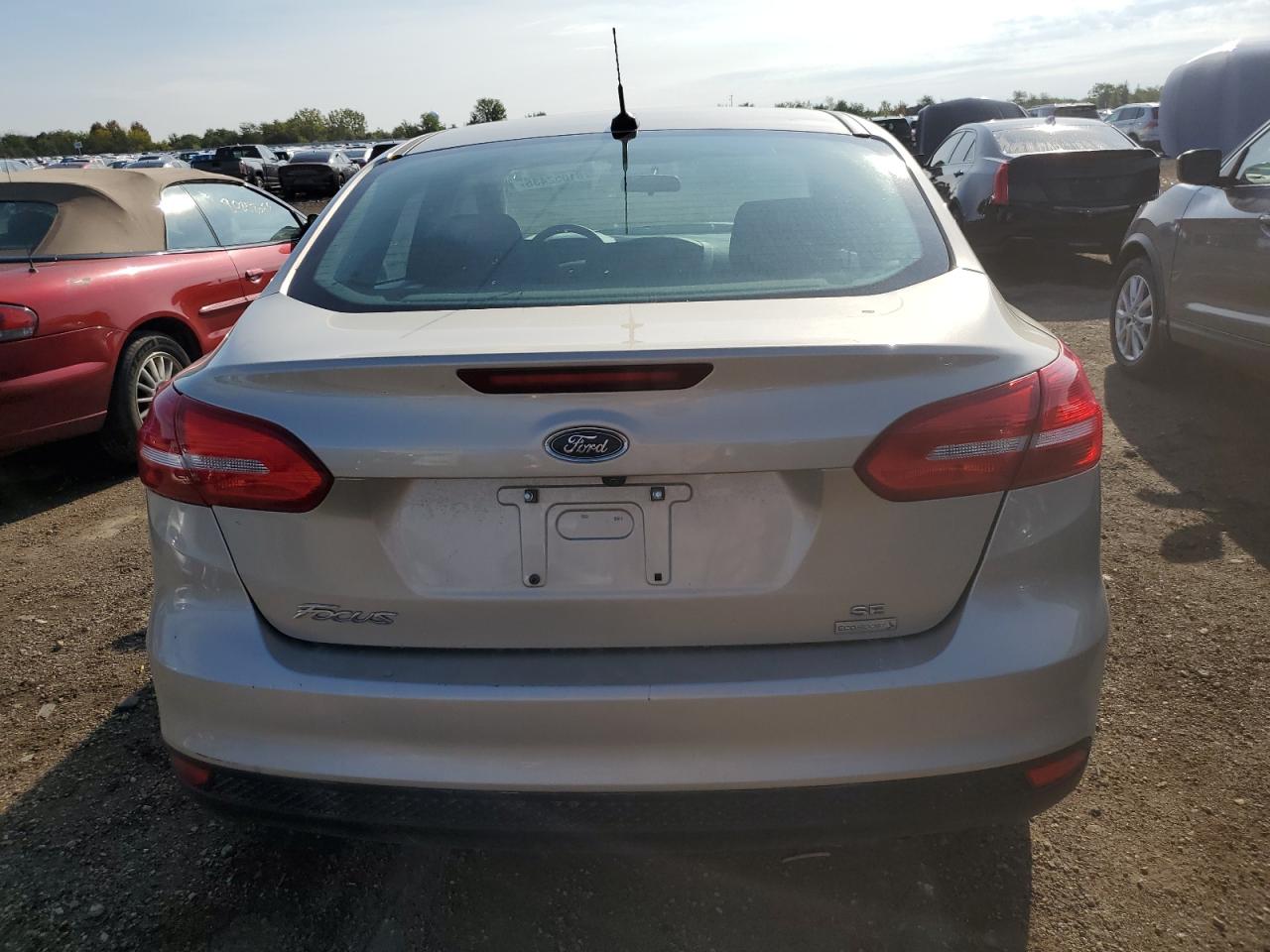 2018 Ford Focus Se VIN: 1FADP3FE2JL214611 Lot: 81052435