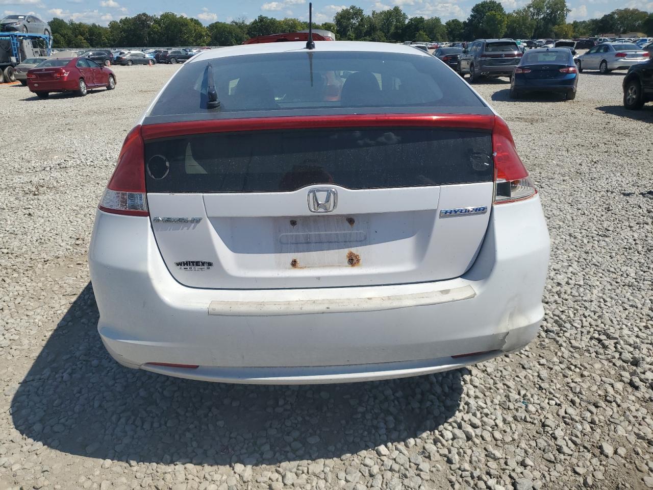 2010 Honda Insight Ex VIN: JHMZE2H74AS007401 Lot: 69814285