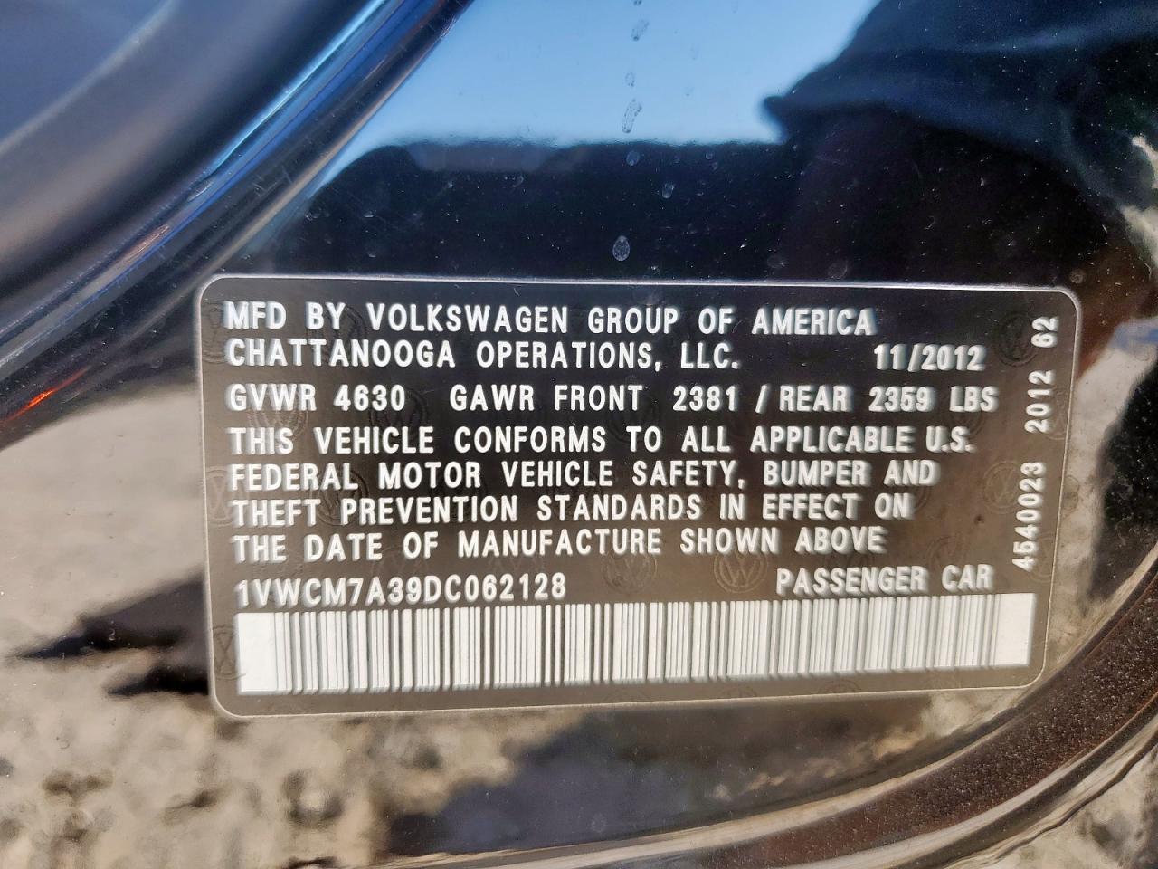 2013 Volkswagen Passat Sel VIN: 1VWCM7A39DC062128 Lot: 84469695