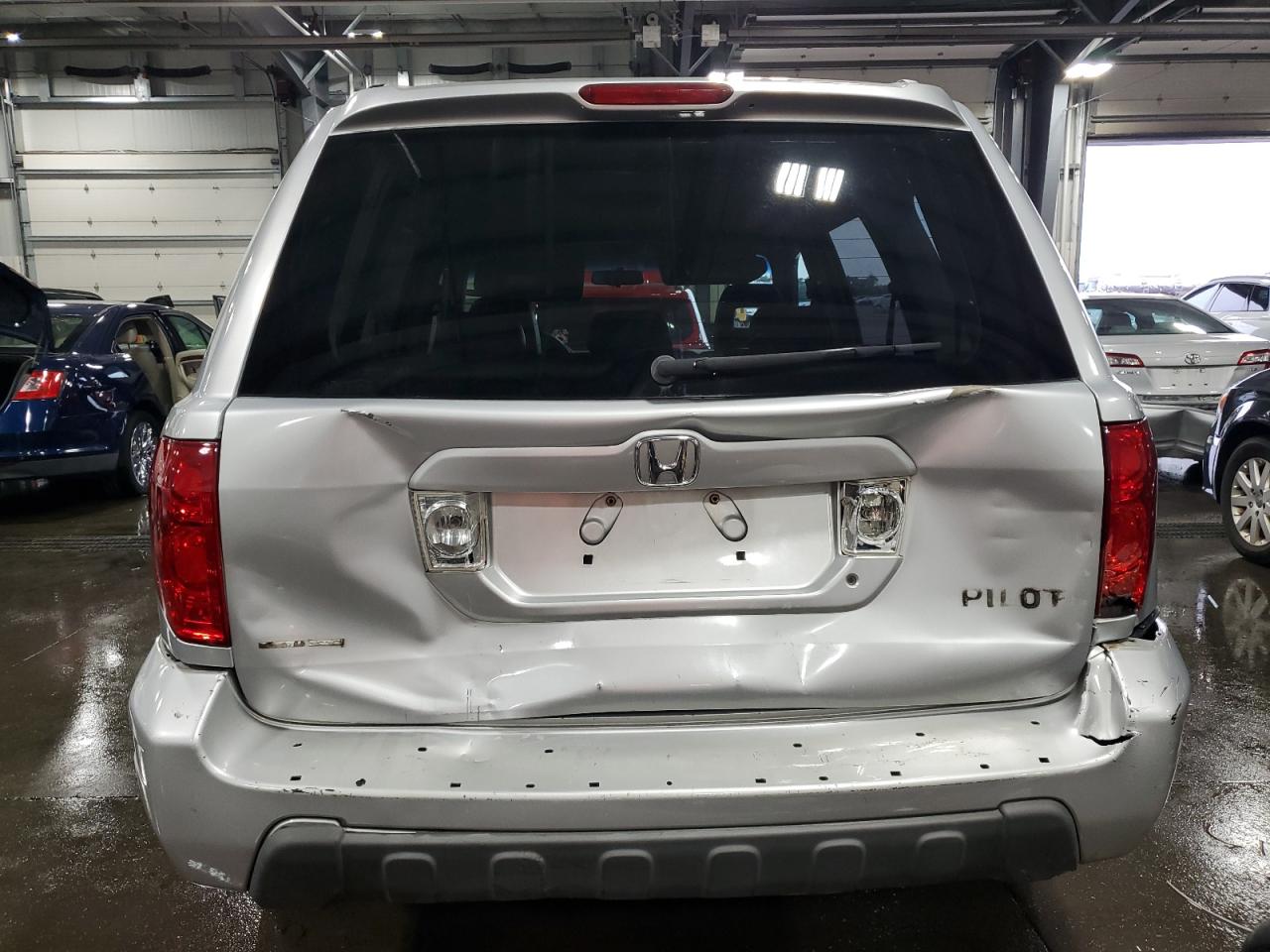 2003 Honda Pilot Exl VIN: 2HKYF18653H552746 Lot: 80702575
