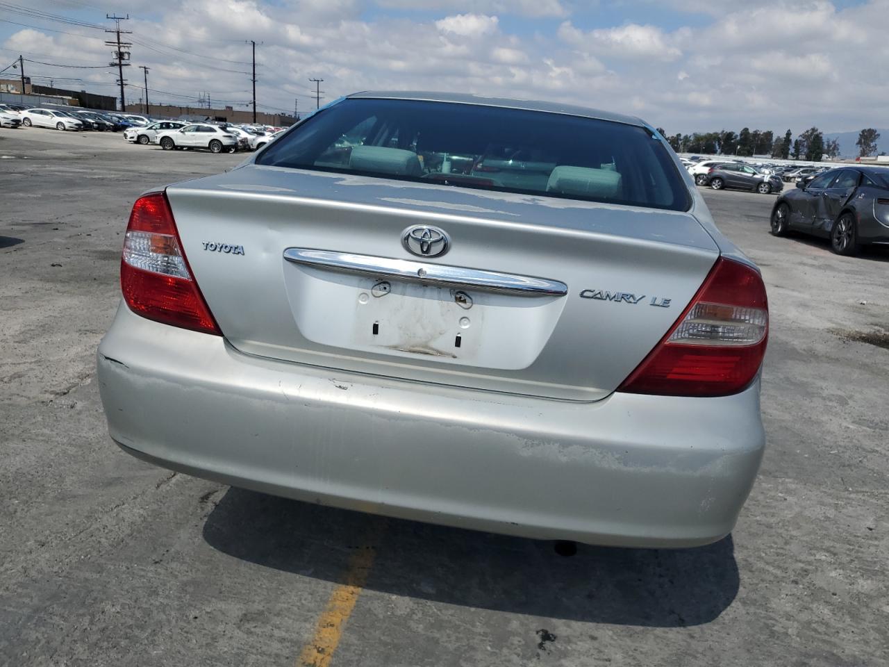 2003 Toyota Camry Le VIN: JTDBE32K330238018 Lot: 81648195