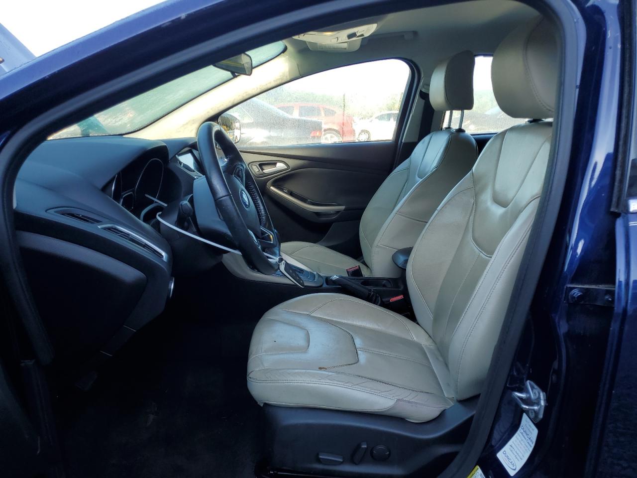 2016 Ford Focus Titanium VIN: 1FADP3J27GL357558 Lot: 71401025
