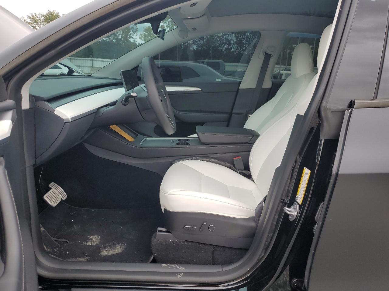 2023 Tesla Model Y VIN: 7SAYGDEF5PF705233 Lot: 84615725