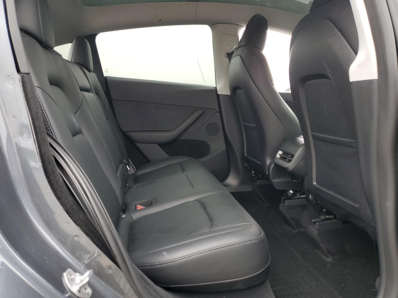 2023 Tesla Model Y VIN: 7SAYGDEE9PA208786 Lot: 82042775