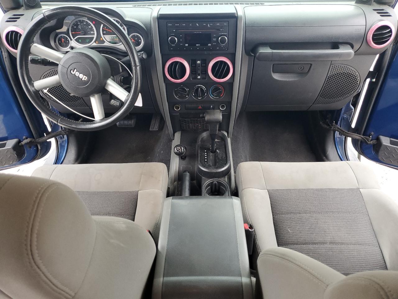 2010 Jeep Wrangler Unlimited Sahara VIN: 1J4BA5H19AL115464 Lot: 81629775