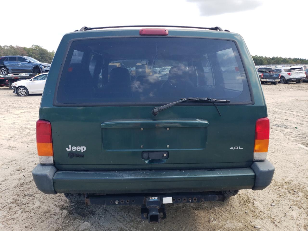 1999 Jeep Cherokee Sport VIN: 1J4FF68S8XL543097 Lot: 82082825