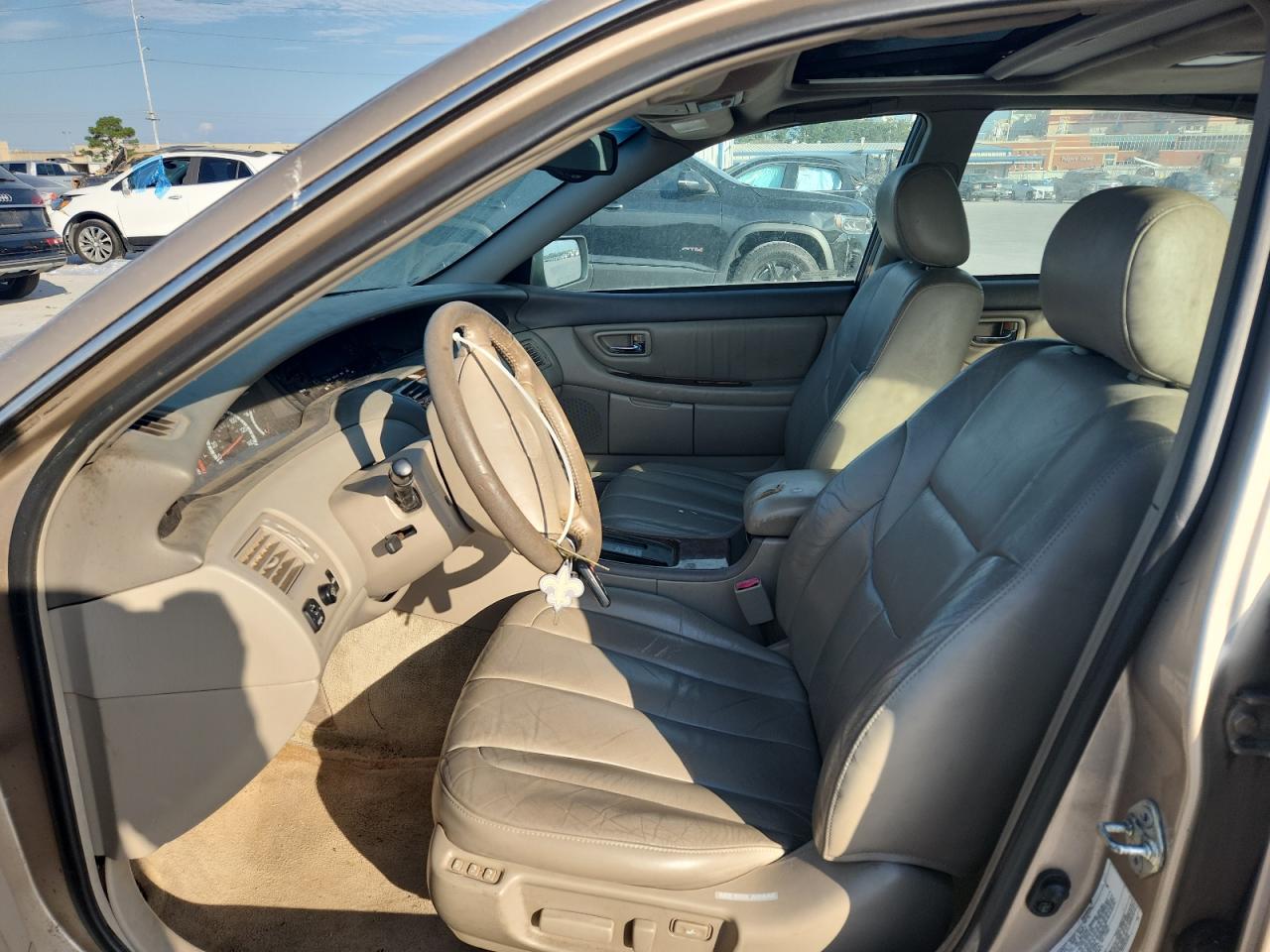 2001 Toyota Avalon Xl VIN: 4T1BF28B61U169065 Lot: 70657585