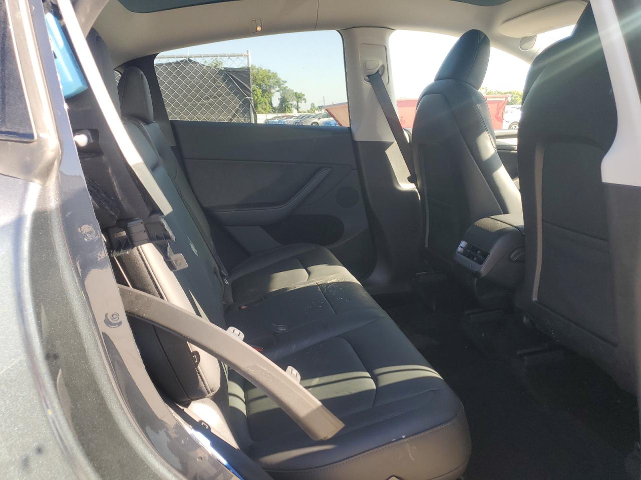 2023 Tesla Model Y VIN: 7SAYGDEE1PA211018 Lot: 80512575