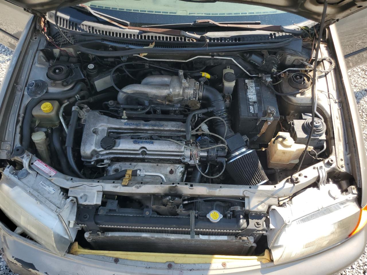 1997 Mazda Protege Dx VIN: JM1BC1416V0145687 Lot: 81469525