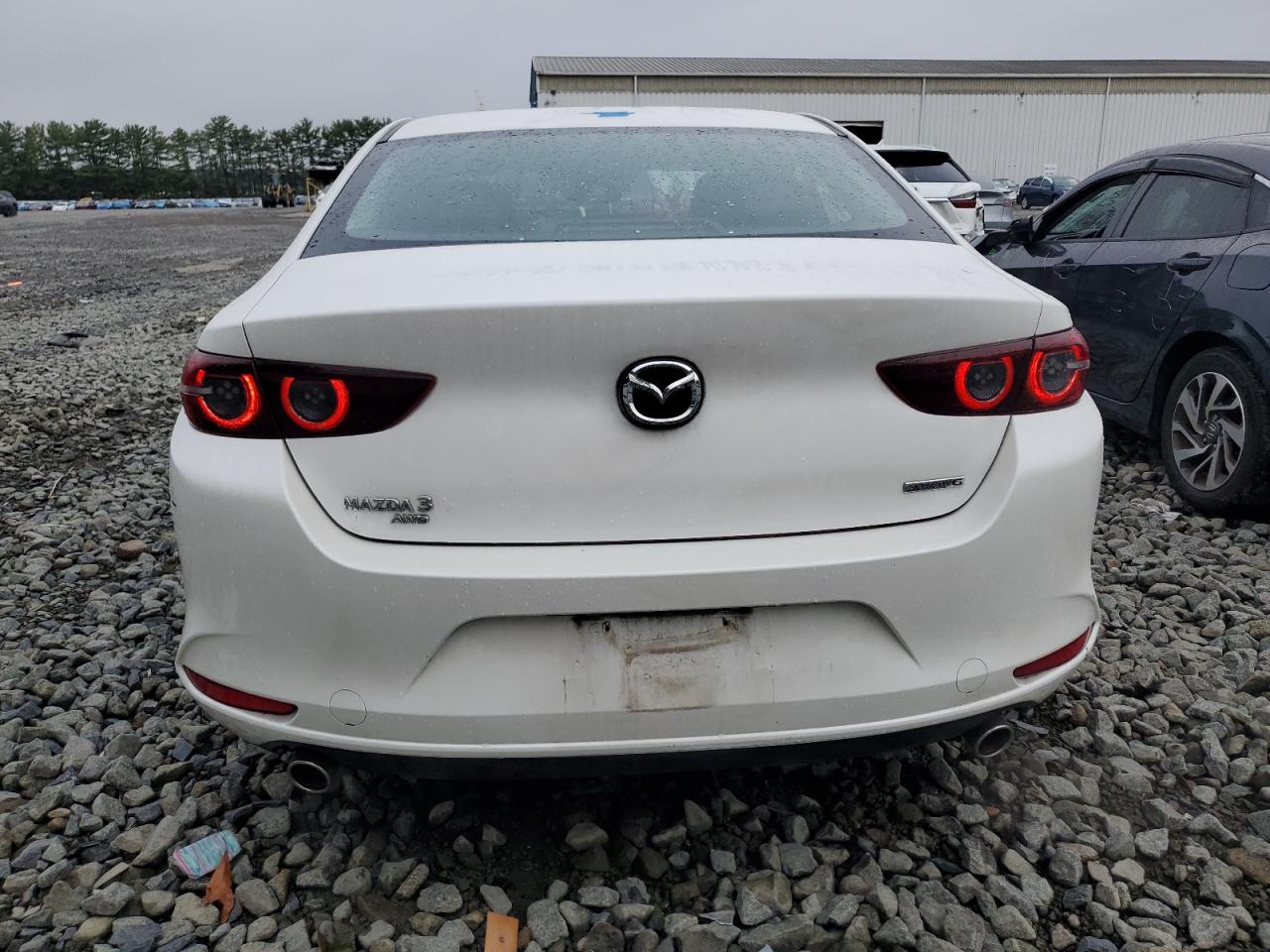 2021 Mazda 3 Premium VIN: 3MZBPBDM0MM204861 Lot: 70135345