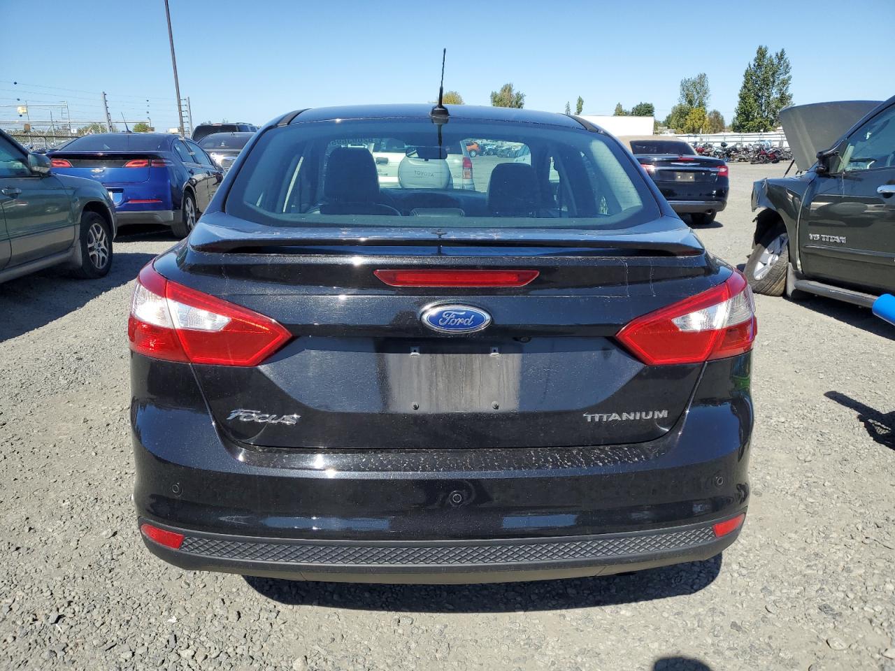 2013 Ford Focus Titanium VIN: 1FADP3J20DL255451 Lot: 82093695