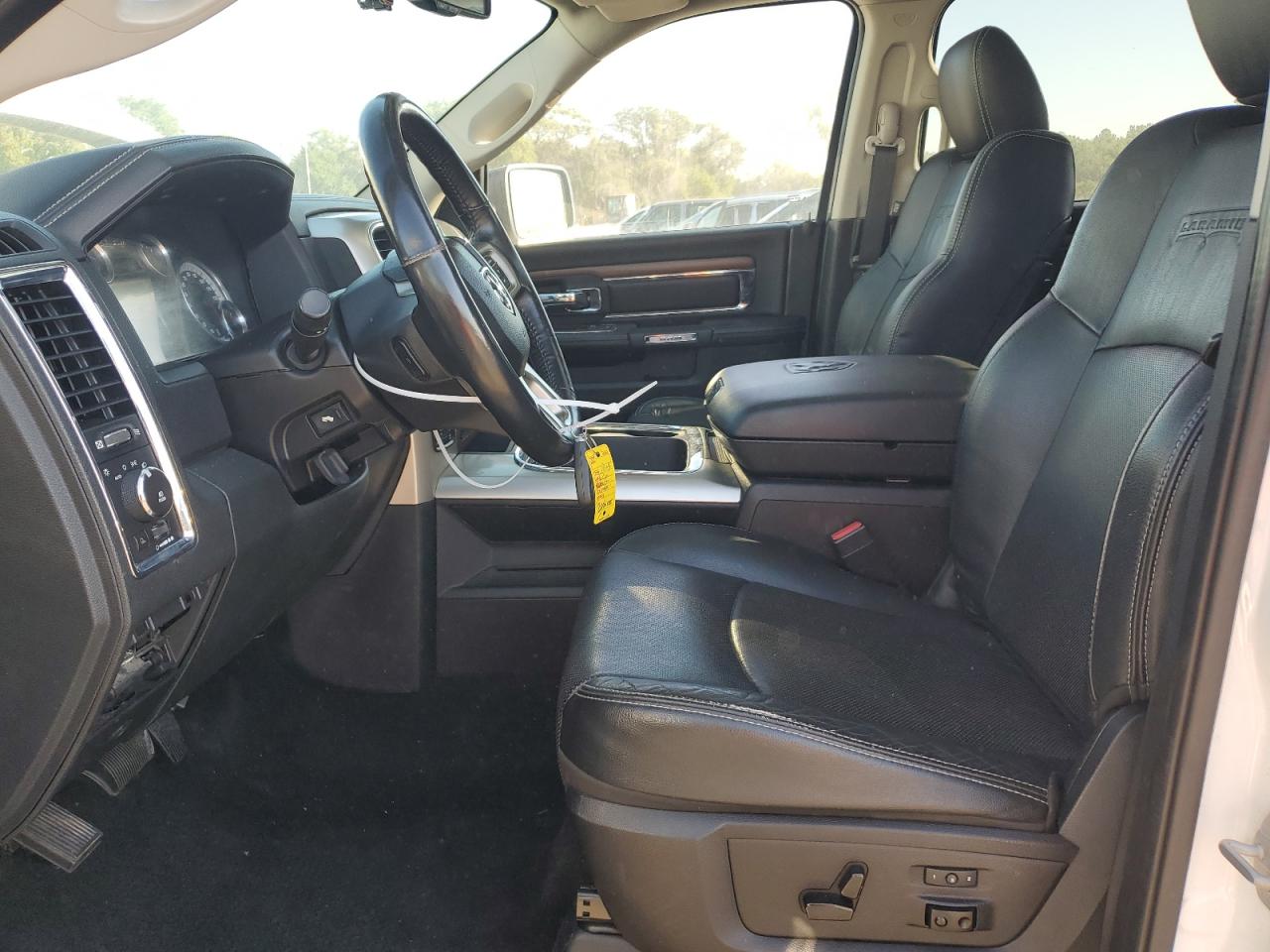 2015 Ram 1500 Laramie VIN: 1C6RR7NT8FS777054 Lot: 84292575