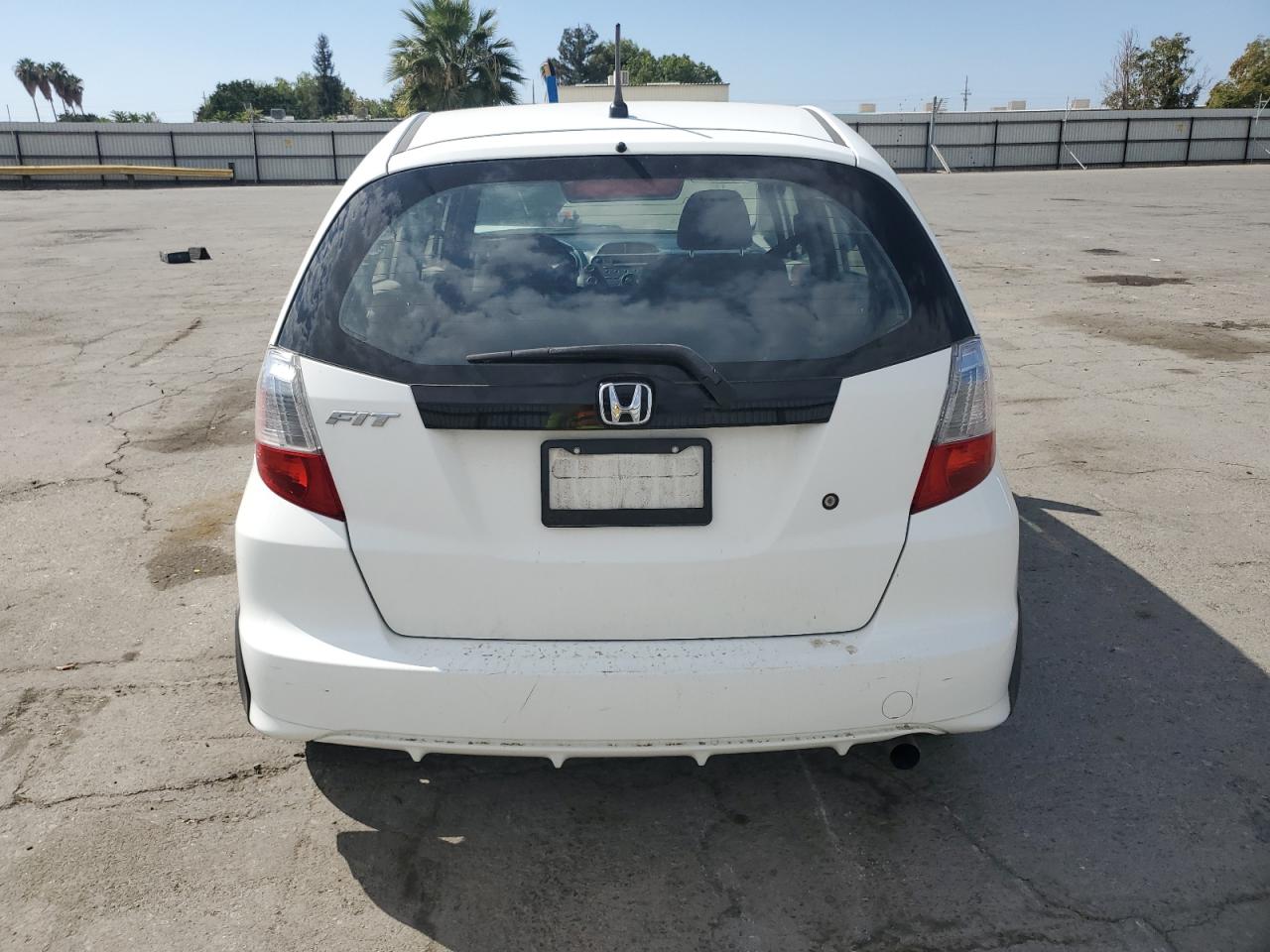 2010 Honda Fit VIN: JHMGE8H27AC016313 Lot: 81878555