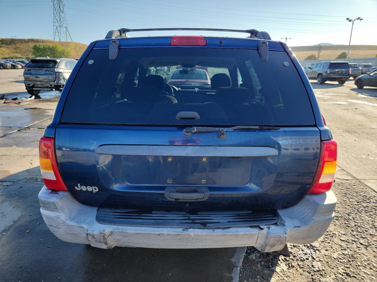 2000 Jeep Grand Cherokee Laredo VIN: 1J4GW48S0YC260736 Lot: 81474135