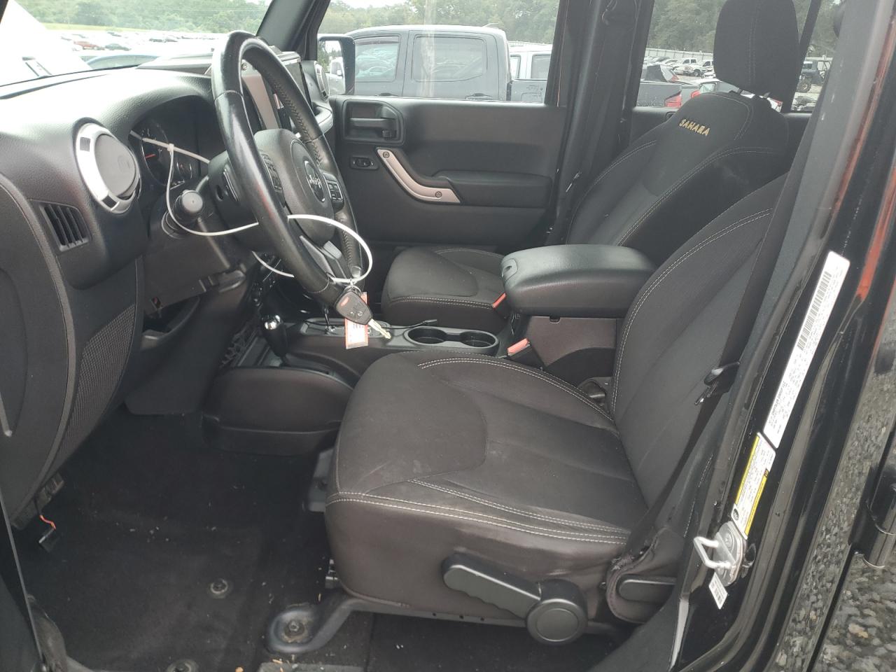 2014 Jeep Wrangler Unlimited Sahara VIN: 1C4BJWEG2EL142631 Lot: 84169635