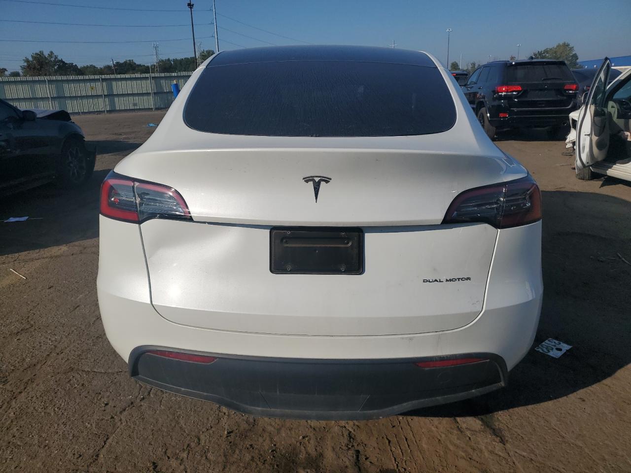 2023 Tesla Model Y VIN: 7SAYGDEE2PF760388 Lot: 80667025